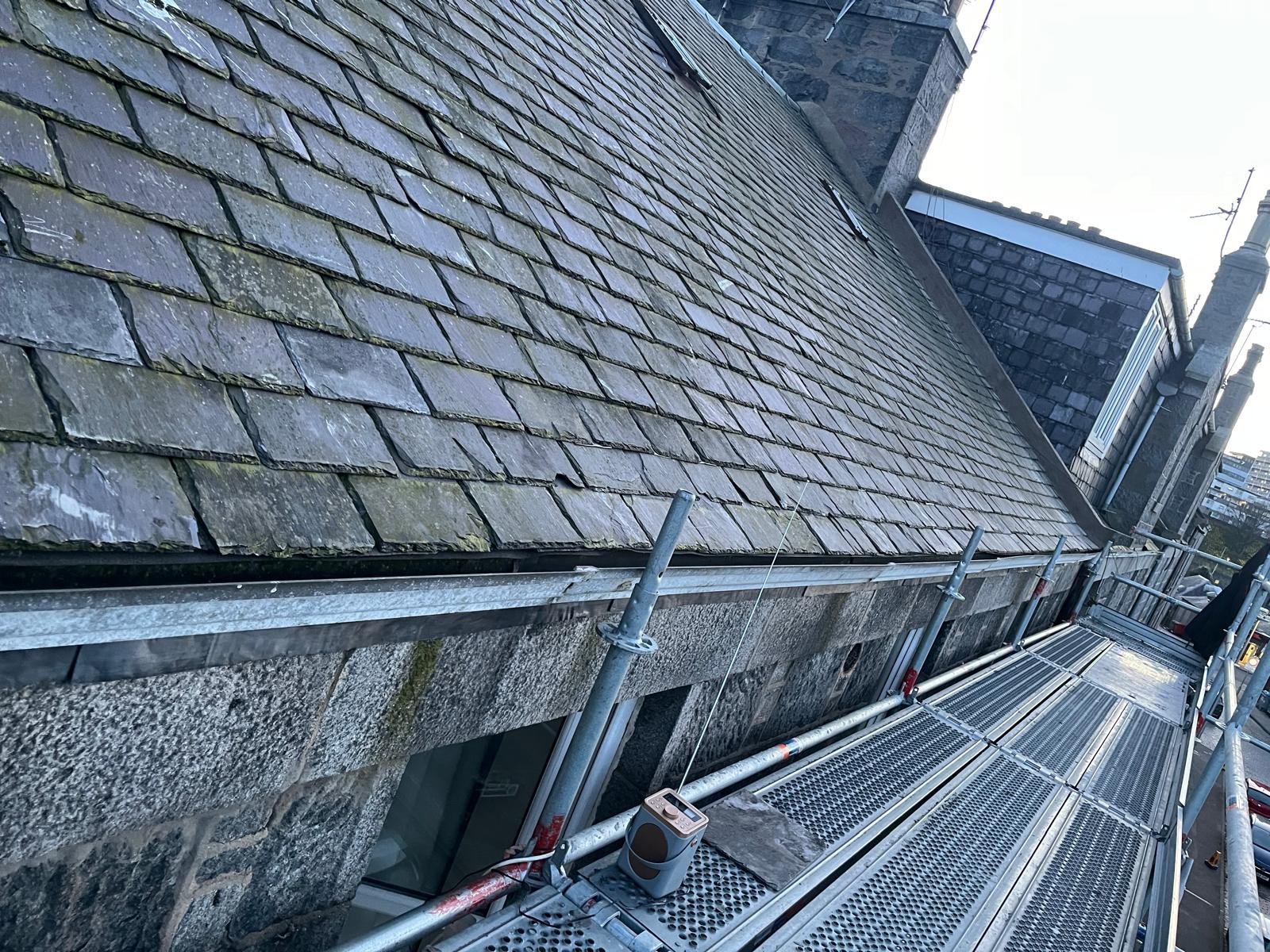 Traditional slate roof being re-roofed by Roof Maintenance Group in Aberdeen